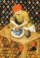 medieval apprentice grinds pigments